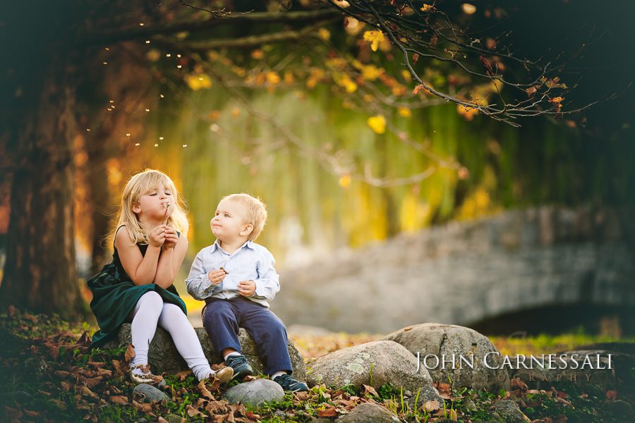 Children dressed in coordinated outfits for family photography session in Syracuse