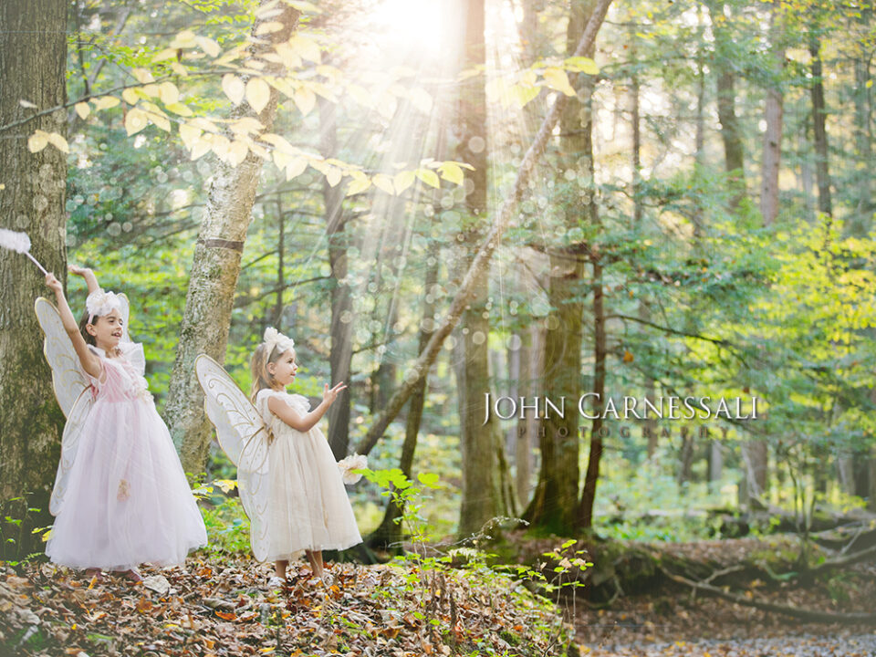 Family posing outdoors during a photo session in Syracuse, NY with natural lighting