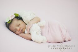 Studio newborn photography Fayetteville and Manlius, NY—clean, cozy blanket portraits with soft light and a calm, baby-led approach. Studio newborn portrait on a soft blanket with neutral tones, Fayetteville Manlius NY newborn photographer