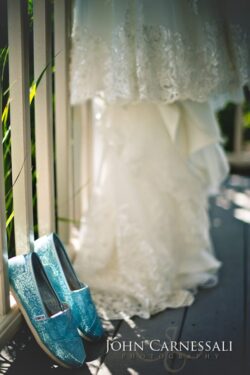 Blue shoes and white lace wedding dress.