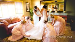 Bride with bridesmaids getting ready at Bayshore Grove in Oswego NY, Oswego wedding photography