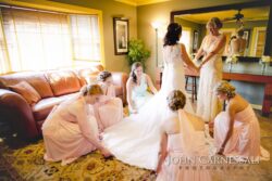 Bridesmaids in matching robes with the bride at Bayshore Grove Oswego NY, Oswego NY wedding photography