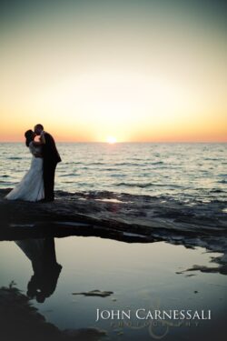 Bride and groom formal portrait at waterfront at Bayshore Grove Oswego NY
