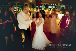 First dance with guests cheering at Bayshore Grove reception in Oswego NY