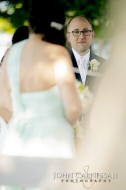 groom looking at bride at Bayshore Grove Wedding ceremony
