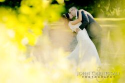 Bride and groom hugging for formal portrait at Bayshore Grove Oswego NY, Oswego wedding photography
