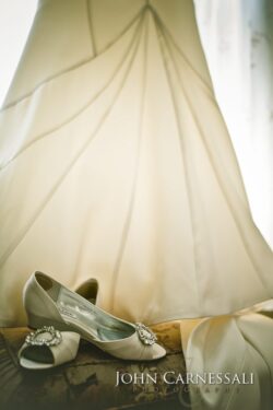 Ivory bridal gown with jeweled peep-toe shoes