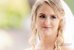 Bride smiling on her wedding day.