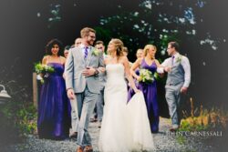 Bride and father walking down the aisle at Belhurst Castle ceremony in Geneva NY, Finger Lakes wedding photography