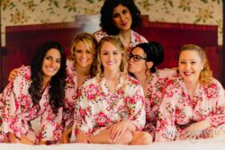 Bride and bridesmaids in pink floral robes