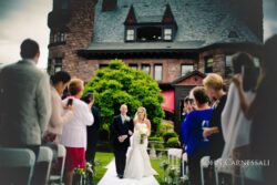 Geneva Wedding Photography by John Carnessali. Father walking bride down the aisle on her wedding day at Belhurst Castle