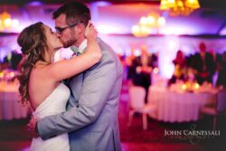 Bride and groom dancing their first dance at Belhurst Castle reception in Geneva NY, wedding day celebration