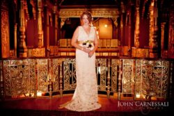 Historic Landmark Theatre interior in Syracuse NY used as a backdrop for wedding photos.
