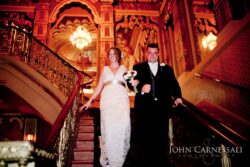 Wide-angle interior photo of Landmark Theatre in Syracuse NY highlighting ornate design for weddings