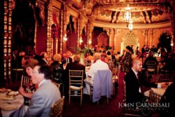 Wide interior view of Landmark Theatre Syracuse showing grand seating and ornate design for weddings
