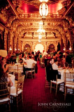 Landmark Theatre Syracuse wedding venue interior with dramatic lighting and historic architectural details