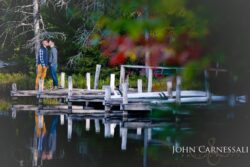 engagement location photo of a dock on calm water with reflections