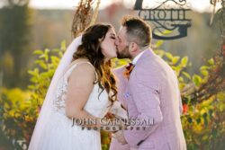 Bride and groom kissing after just getting married