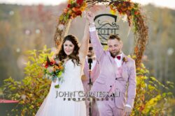 Bride and groom celebrating after just getting married