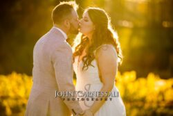 Romantic sunset photo of couple on their wedding day