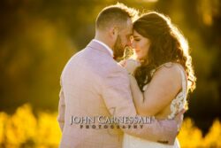 Bride and groom sharing a romantic moment on their wedding day