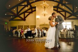 Bride and groom dancing together at the reception