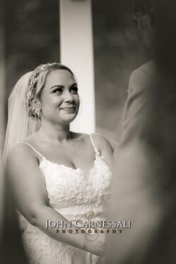 Bride smiling during a candid indoor portrait