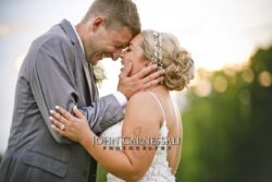 Close-up of bride and groom embracing