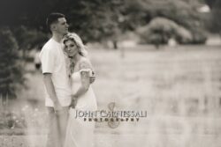 intimate sepia meadow portrait of couple