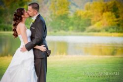 Orchard Valley Golf Club Bride and Groom Kissing at an Orchard Vali Wedding
