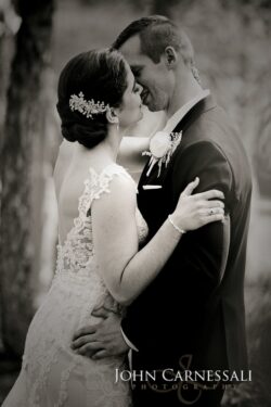 Black and white intimate wedding embrace