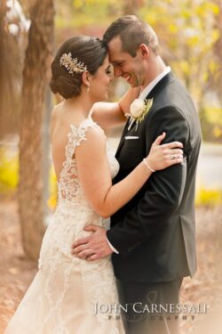Intimate bride and groom embrace