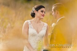 Bride and groom in nature setting.