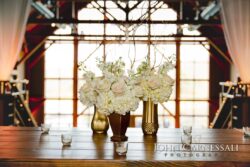 Elegant floral arrangement on wooden table.