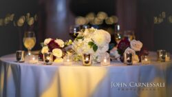 Elegant table setting with flowers and candles.