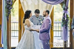 Wedding ceremony with pastel purple decorations