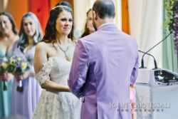 Bride and groom facing each other