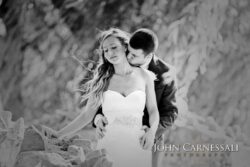 Black and white bride and groom embrace