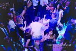 People dancing energetically at a lively party.