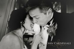 Bride and groom sharing an ice cream.