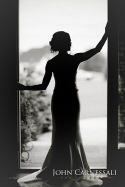 Silhouette of bride in doorway