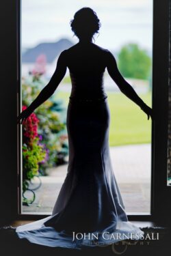 Bride silhouette framed by open doorway