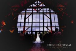 Couple at altar framed by large window grid