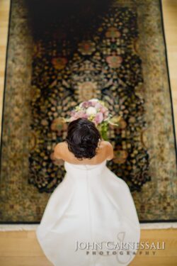 Overhead view of bride with bouquet