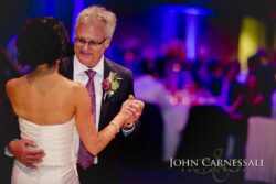 Bride dancing with older gentleman