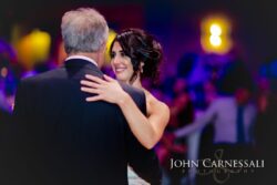 Bride smiling during father daughter dance