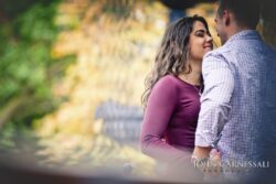 Engagement Session with Couple standing together outdoors in soft light