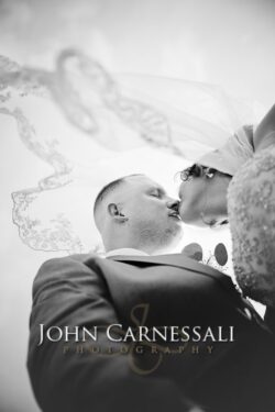 Black-and-white fine art wedding detail photograph.