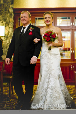 Bride and groom walking together during their wedding ceremony.