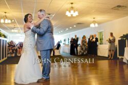 Bride and groom dancing together during their first dance.